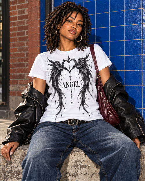 AI-generated styling mockup: Angel Wings and Heart tee with denim, open leather jacket and burgundy bag.